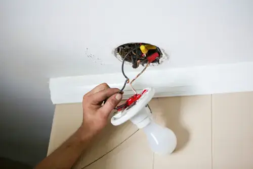 Why Are the Lights Flickering in My House? Causes & Fixes